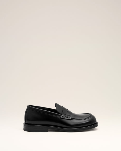 Mocassins noirs en cuir de veau - 1 - Ami Paris